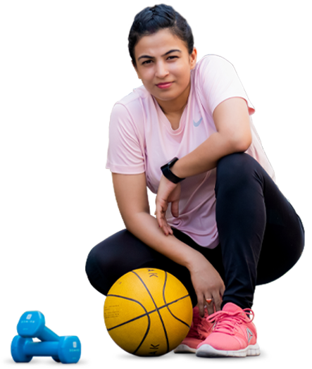 Dr. Jyoti Srivastav in workout gear with dumbbells and a basketball